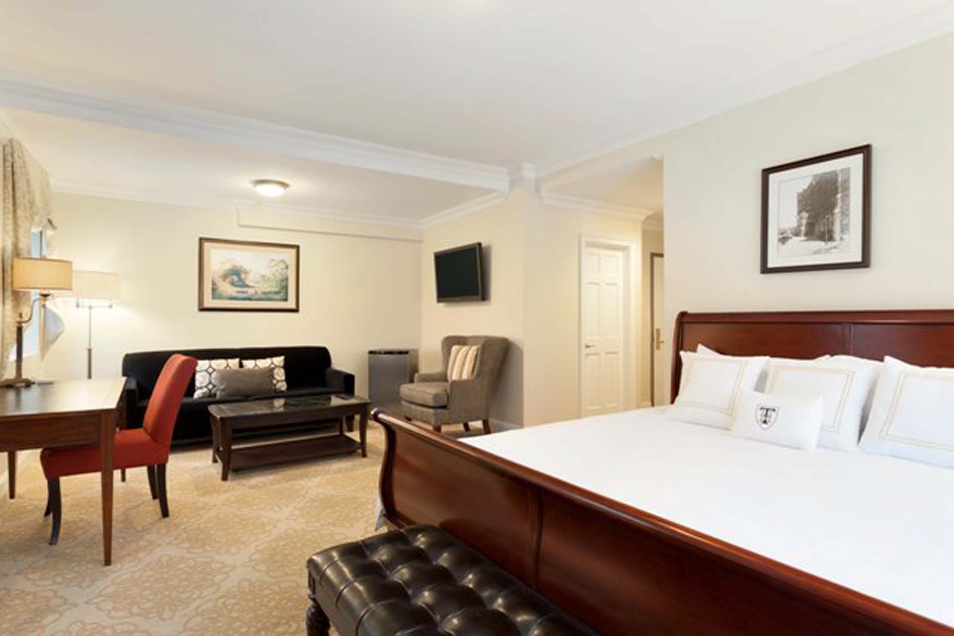 Executive Jr Suite with common area and a bed